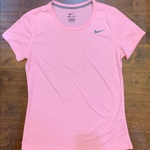 Never worn pink Nike dri-fit women’s tee (size M)